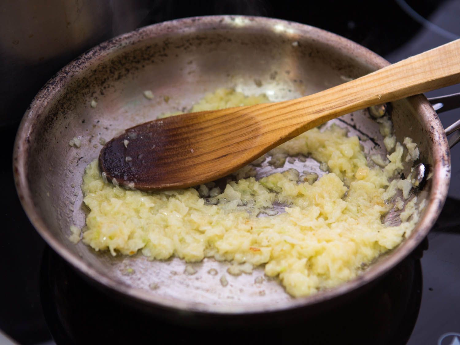 Sauteeing minced onions for Swedish meatballs.