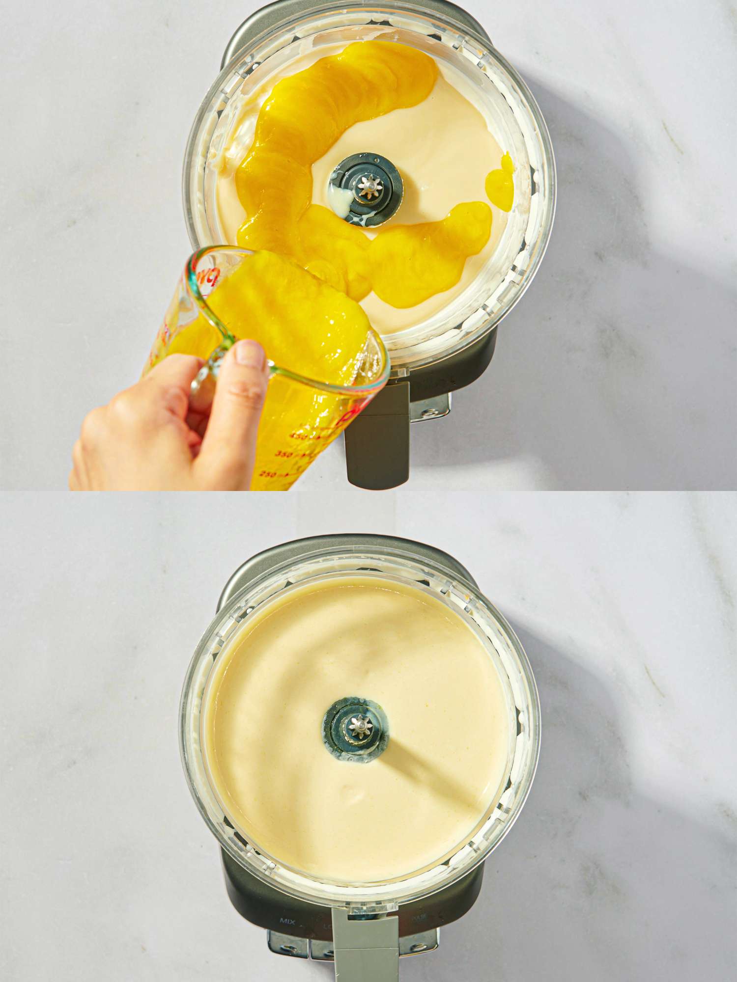 Hand pouring mango mixture into a blender blended mango and cream mixture seen in a blender