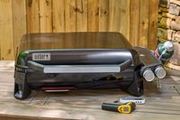 The Weber Slate 22 inch Rust-Resistant Tabletop Griddle on a table