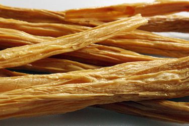 A pile of dried bean curd sticks. 