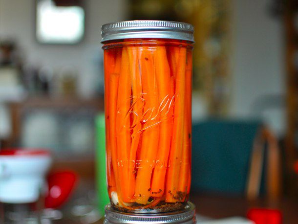 A jar of dilly carrots, ready to store.