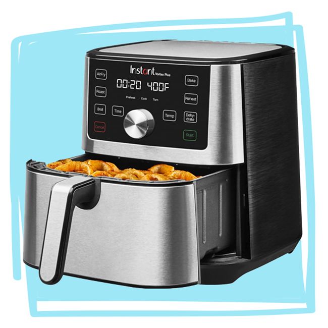 Instant Pot Vortex Plus air fryer with food in the cooking basket