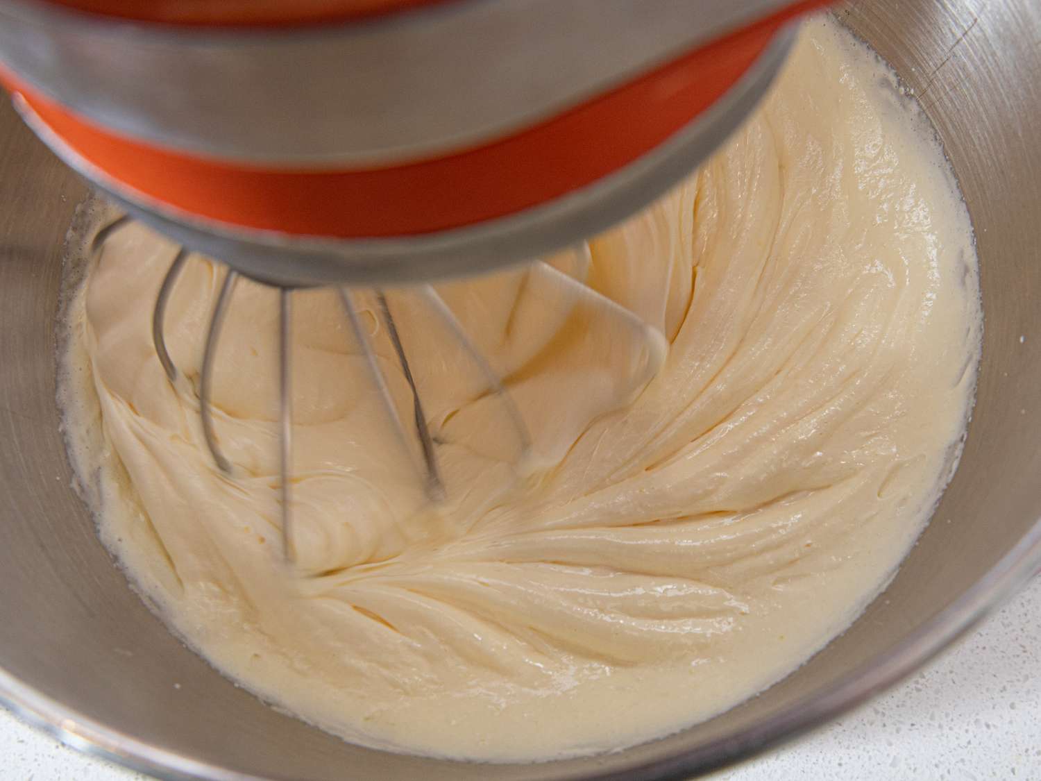 Overhead view of cake mix in stand mixer