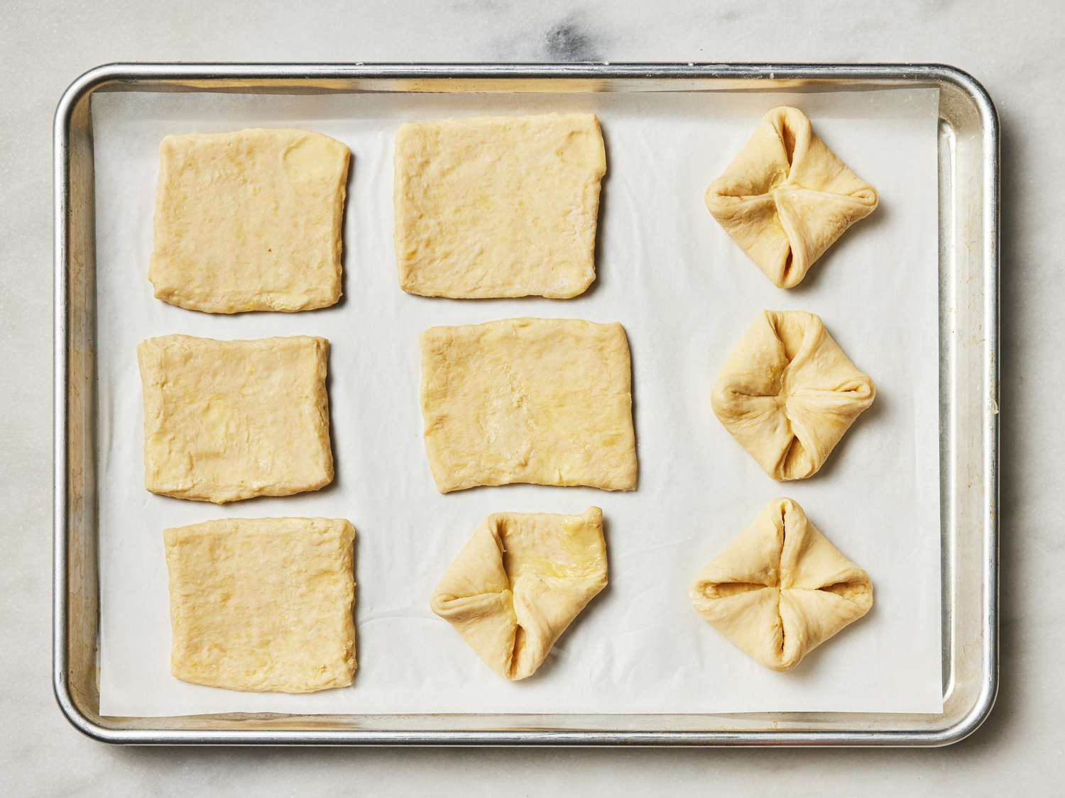 Overhead view of half folded danishes