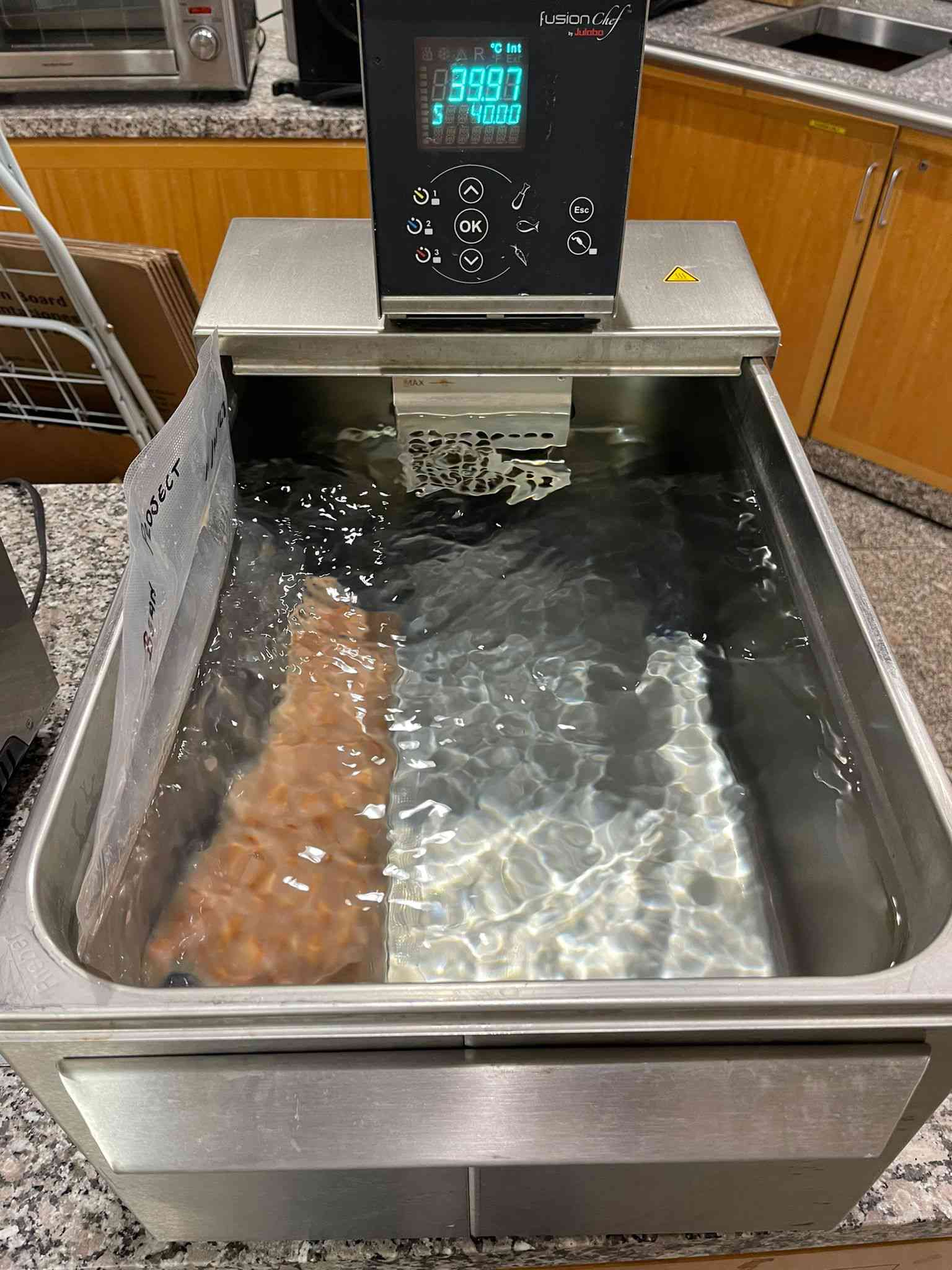 Beans being cooked in a bath