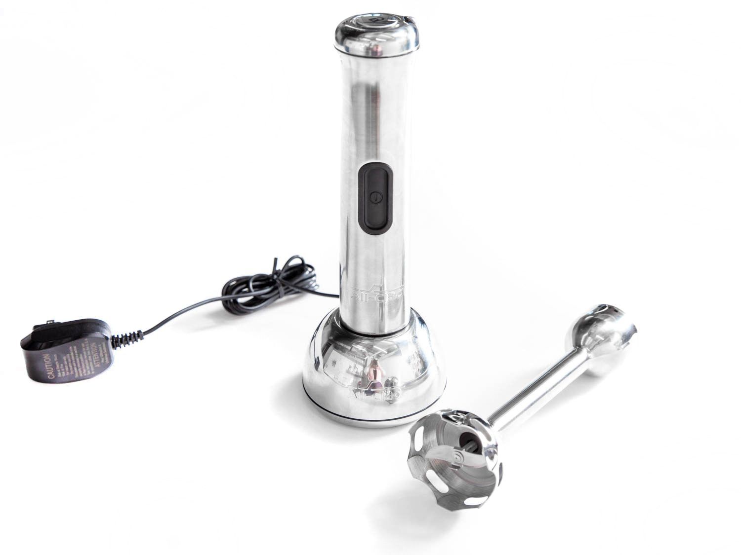 The All-Clad cordless immersion blender, shown with the motor unit on the charging base and the blending shaft next to it.
