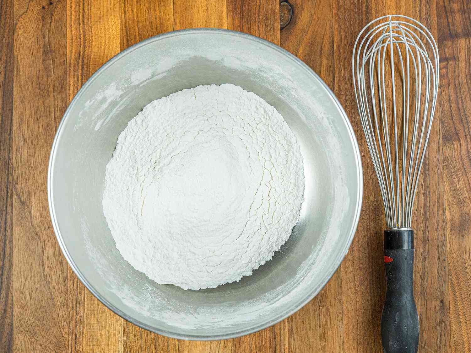 Dry ingredients for bibingka mixed in a bowl