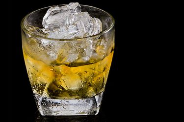 A glass of Irish whiskey on the rocks. 