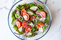 a salad served in the glass bowl of the oxo spinner
