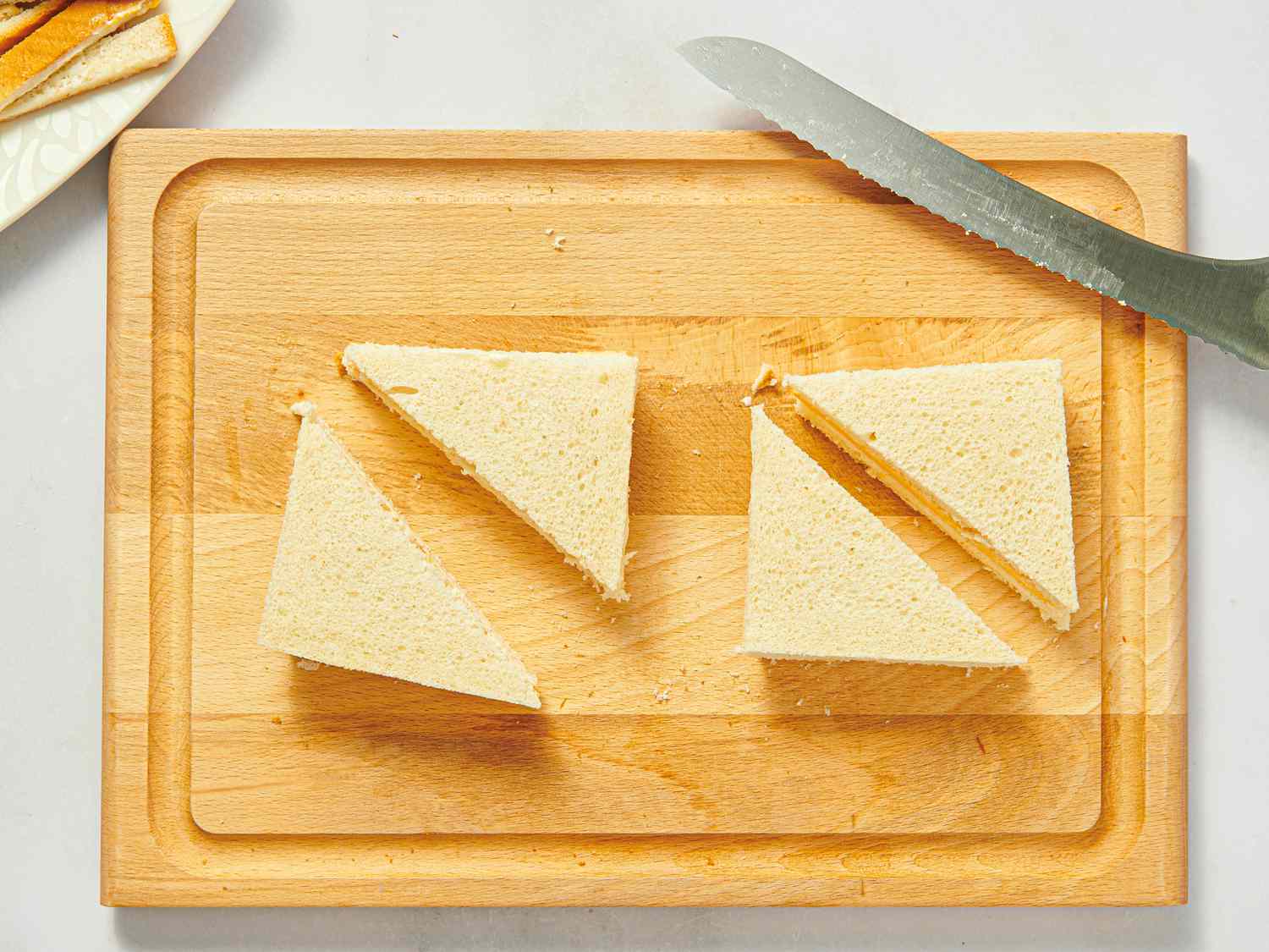 Overhead view of cutting cheese frenchees