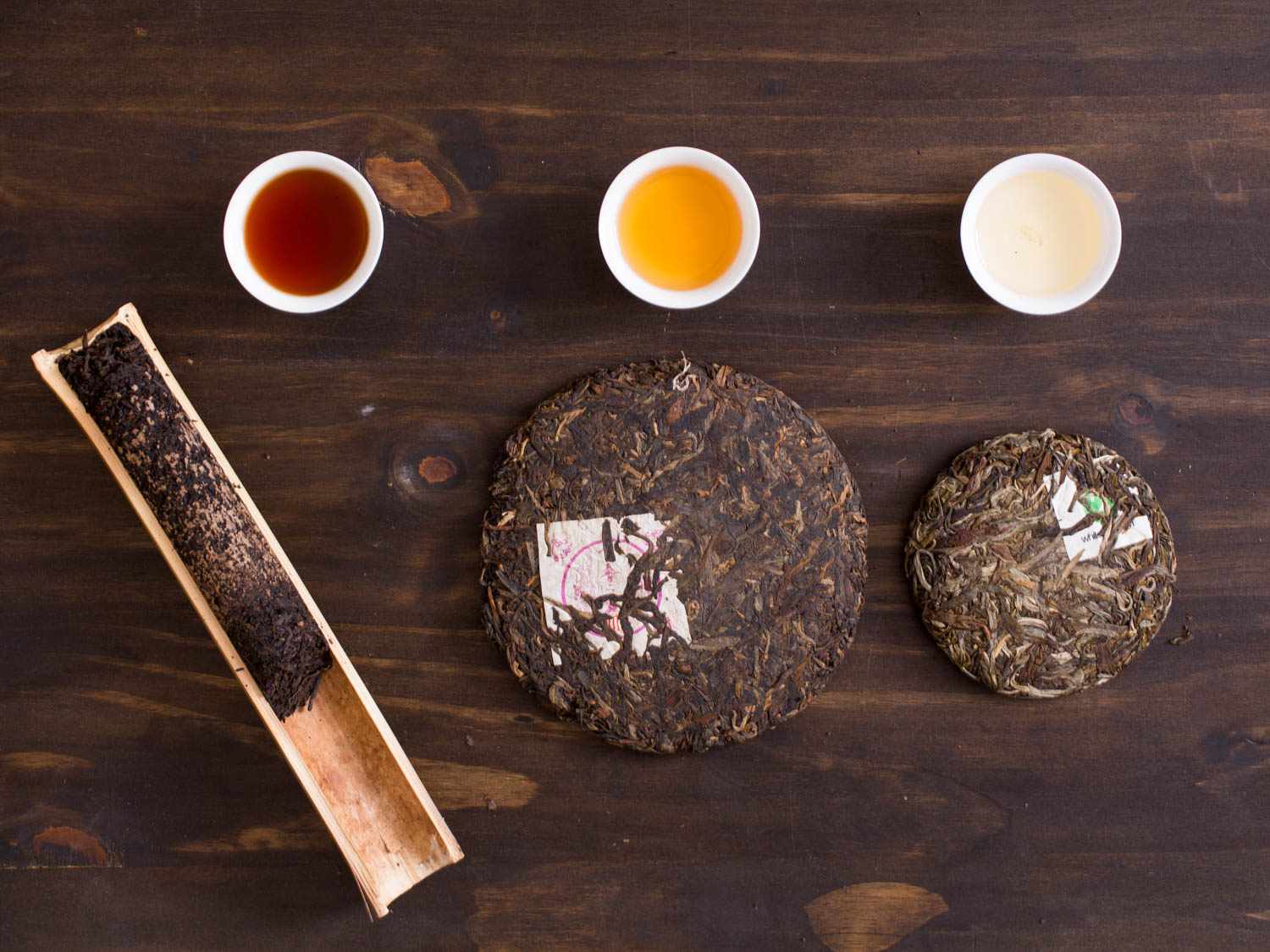 Left to right: ripe pu-erh, aged raw pu-erh, and fresh raw pu-erh