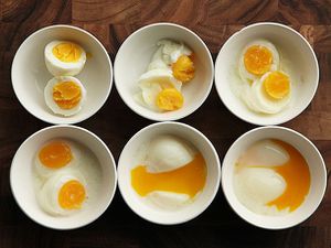Overhead comparison shot of eggs cooked sous vide at different temperatures