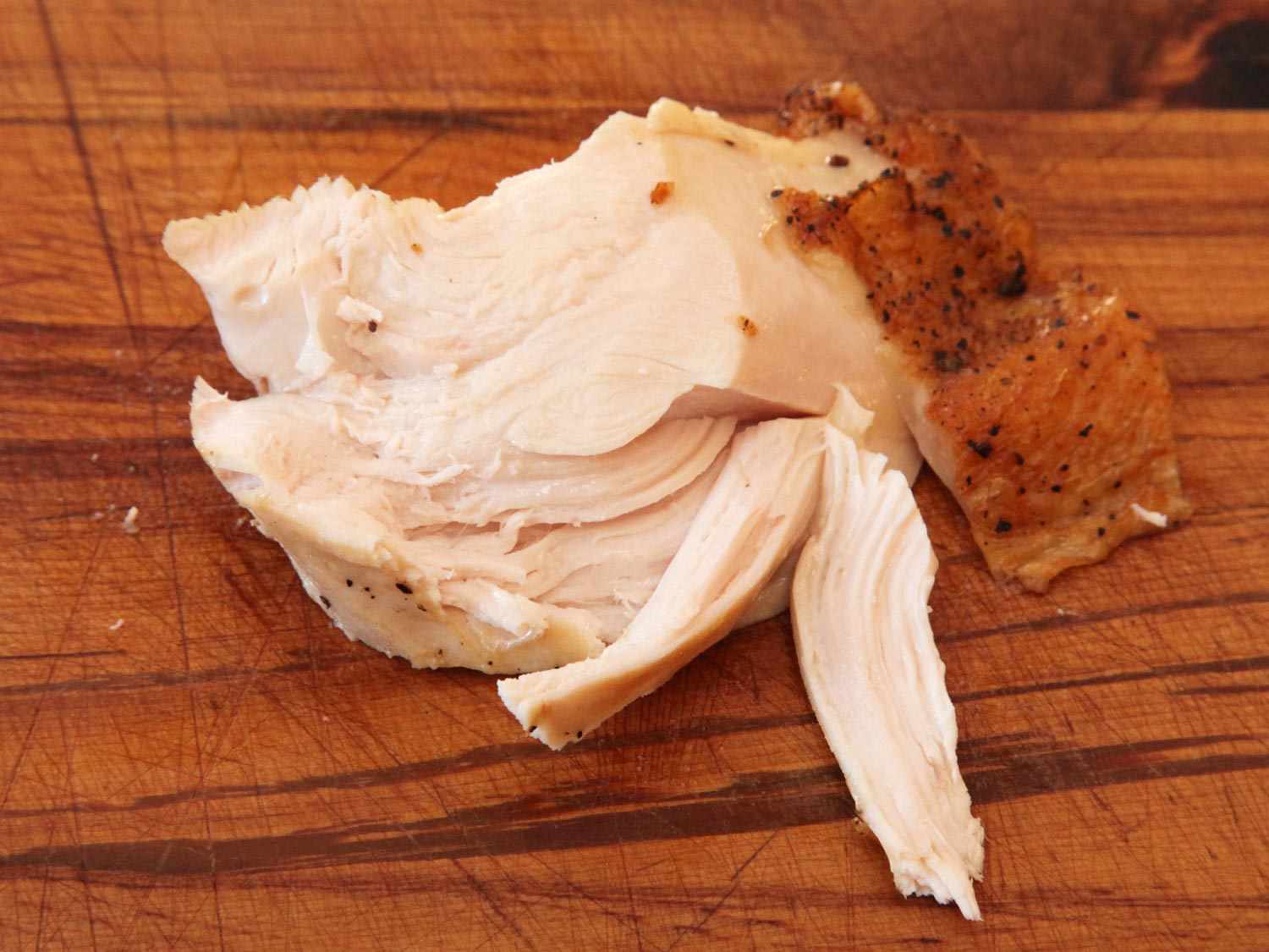 Sample piece of sous vide chicken breast cooked to 160 degrees Fahrenheit--firm and stringy.