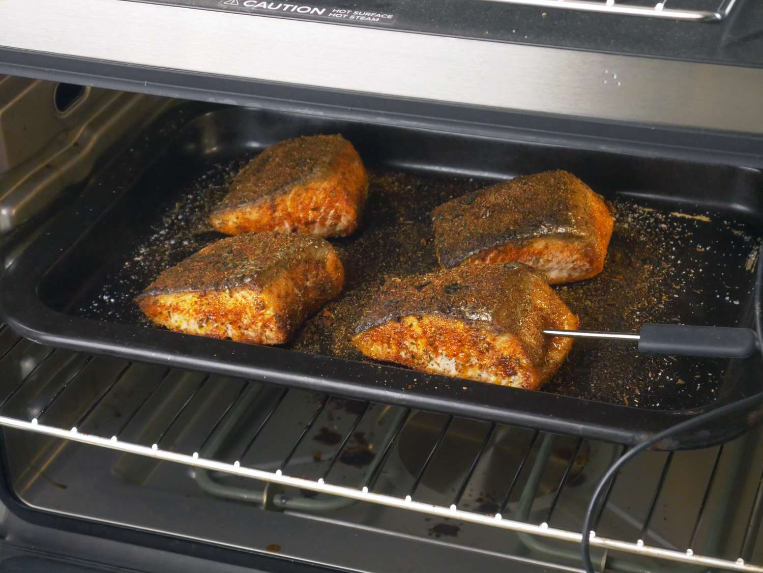 salmon with a probe inside a fillet 