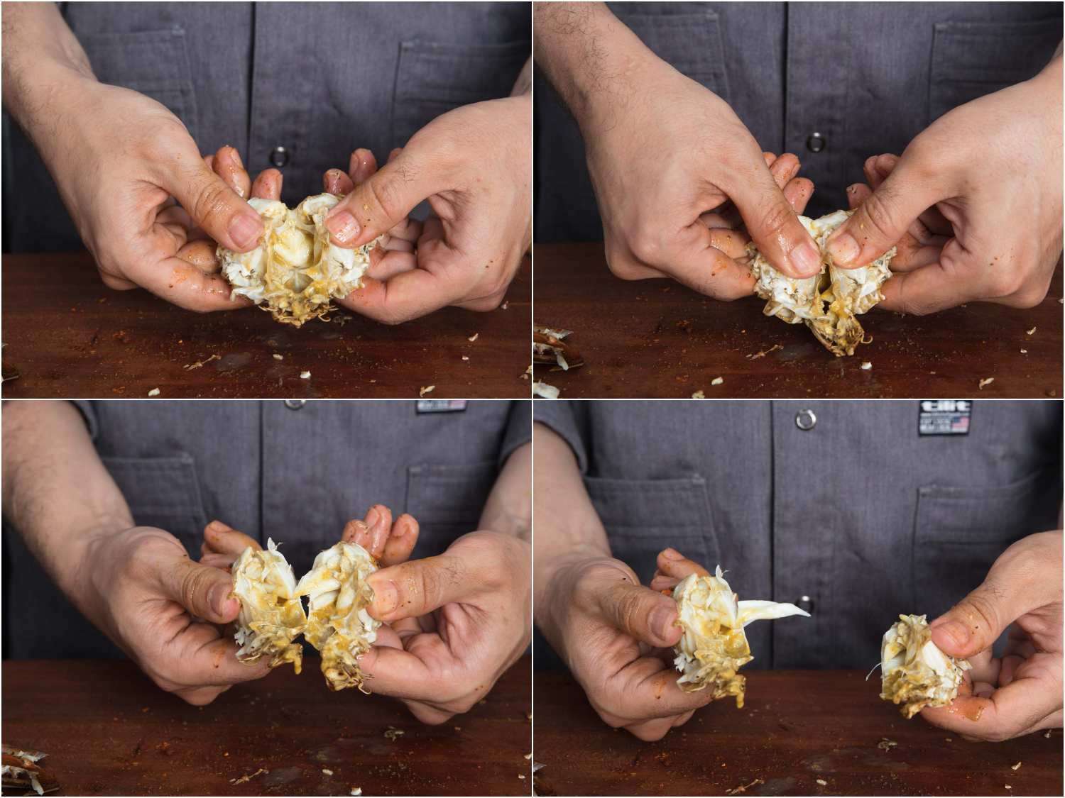 Opening up half of the bottom shell of a crab and exposing the meat