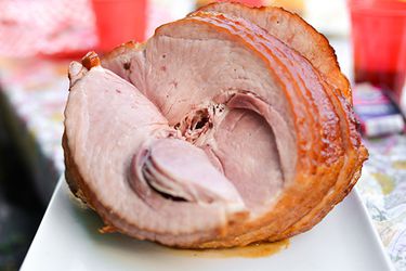 A bone-in spiral cut ham, grilled and glazed with Coke and pineapple.
