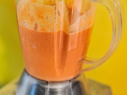 Creamy French dressing is mixed in a blender.