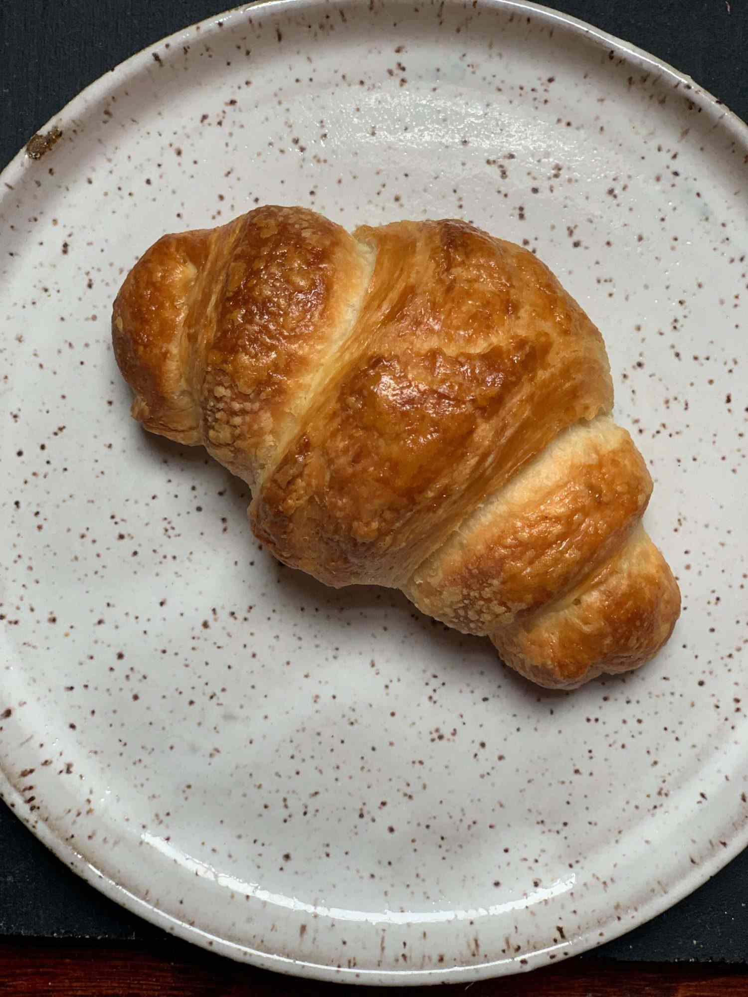 Homemade croissant on a plate
