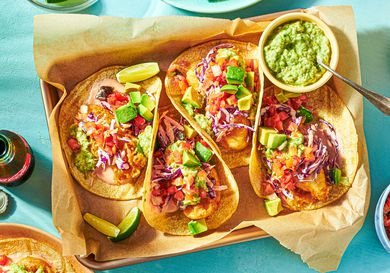 Overhead view of 4 fish tacos