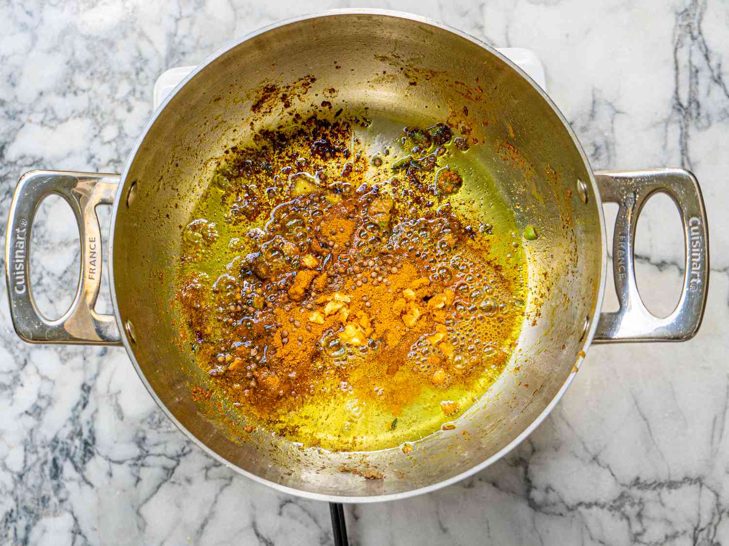 Overhead view of spices in pot