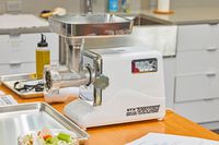 STX International Turboforce Classic 3000 Series Electric Meat Grinder & Sausage Stuffer displayed on counter top