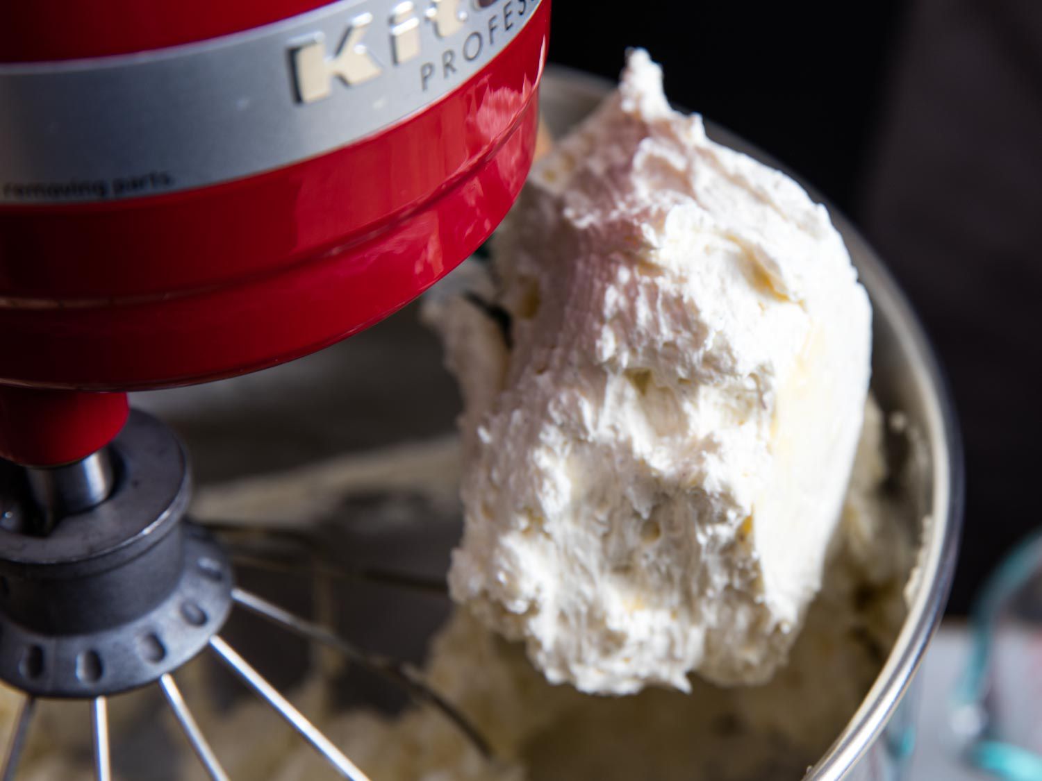 A stand mixer with curdled buttercream.