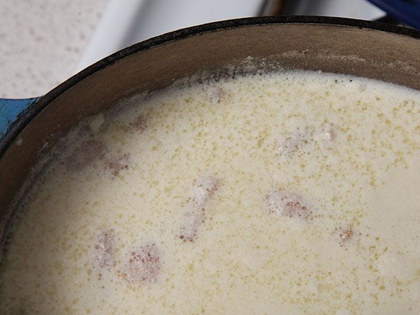 Greasy, broken texture of chowder without roux.