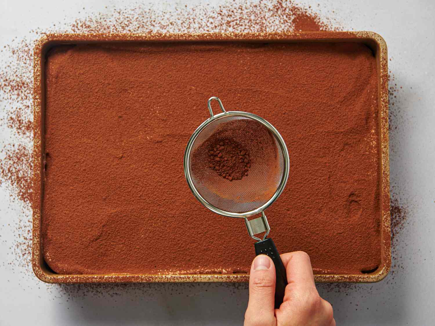 Dusting with cocoa powder