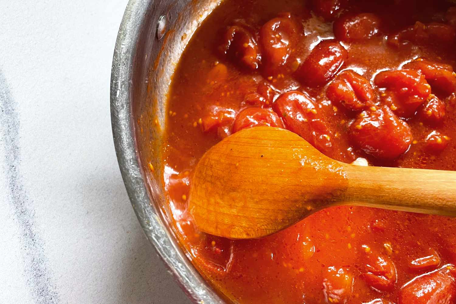 Tomato sauce being stirred with a Jonathan’s Spoons Spootle