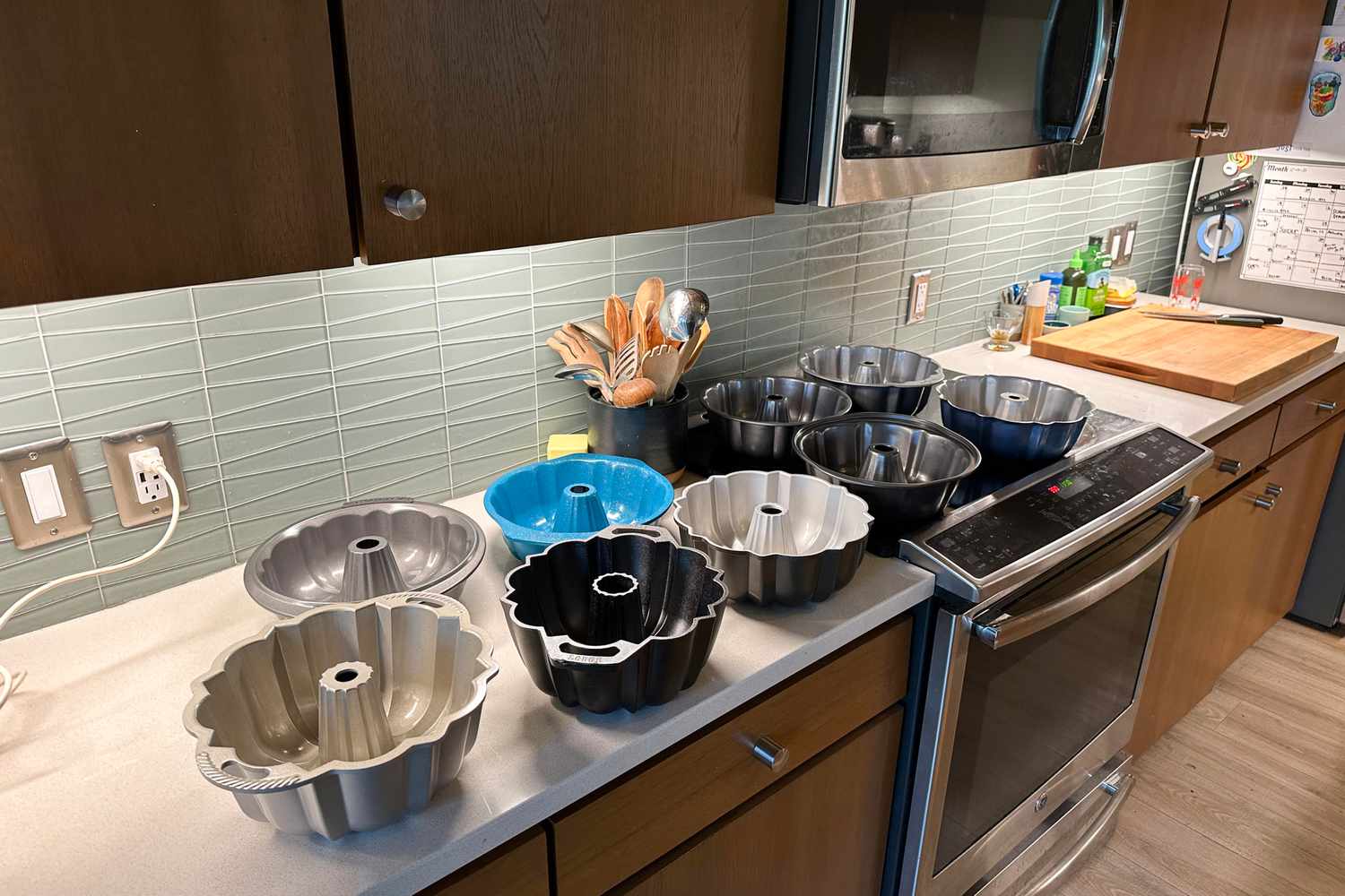 A collection of Bundt pans on a kitchen counter