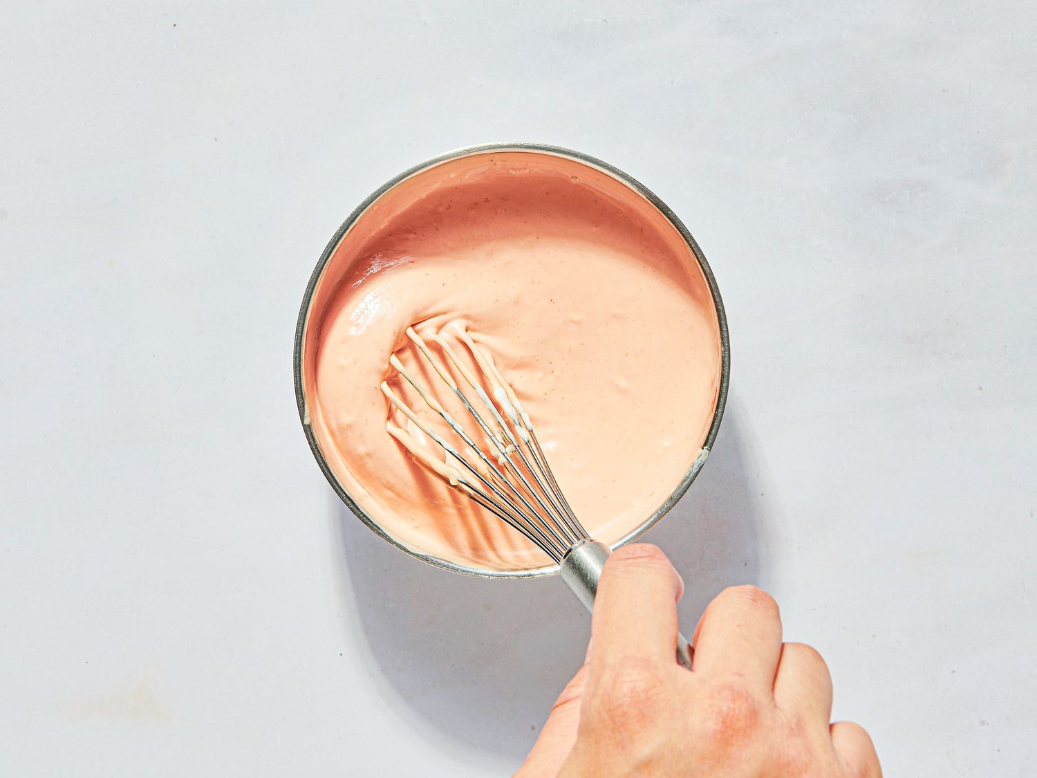 Overhead vie of mixing mayonnaise 