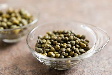 A small bowl of capers. 
