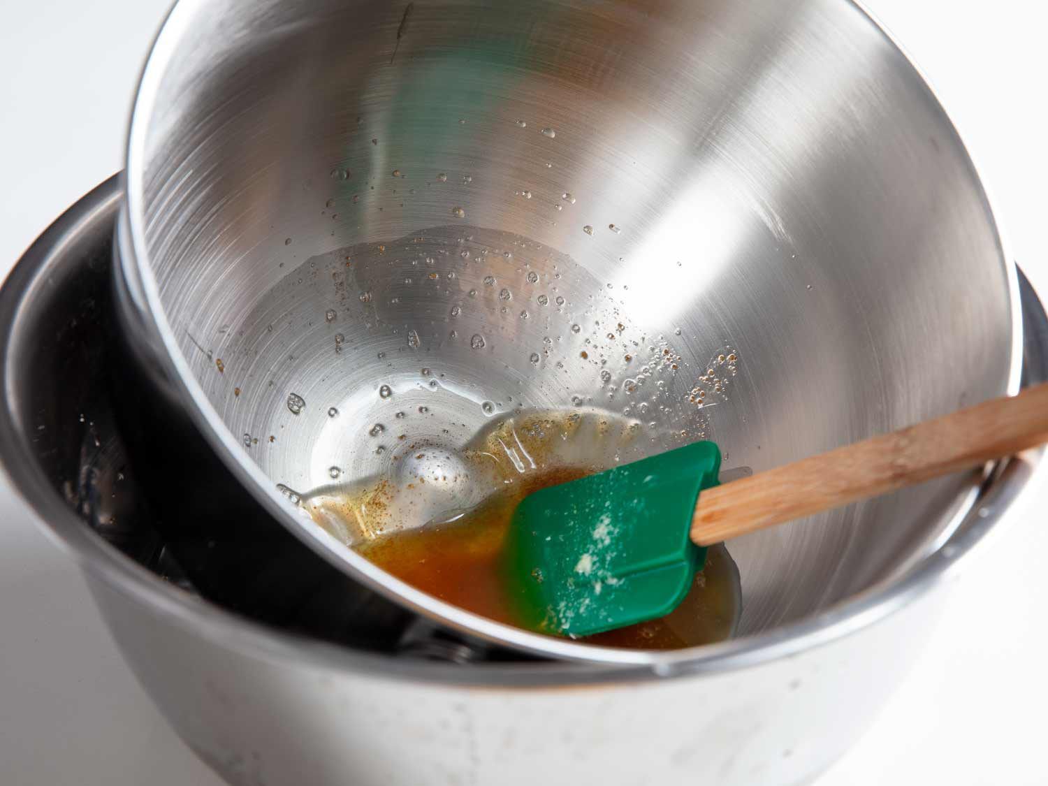 Cooling the browned butter quickly in a bowl set over a cold water bath.