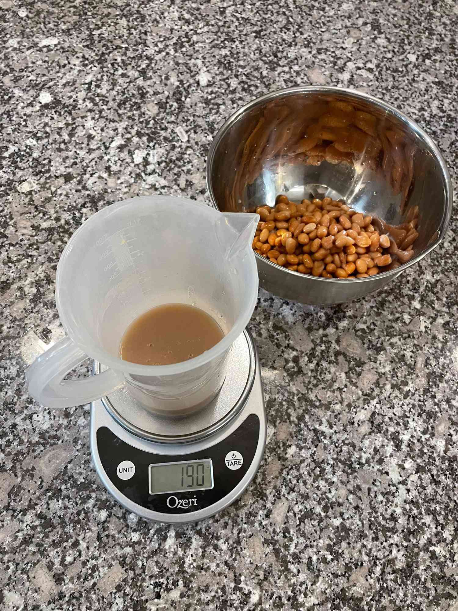 Liquid separated from beans and weighted