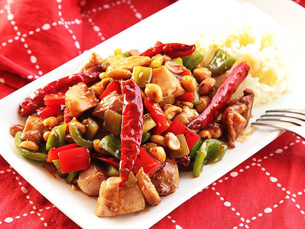 Marinated chicken thighs, properly stir-fried peppers and celery, roasted peanuts, and a sweet, sour, and savory sauce on a takeout-style kung pao chicken.