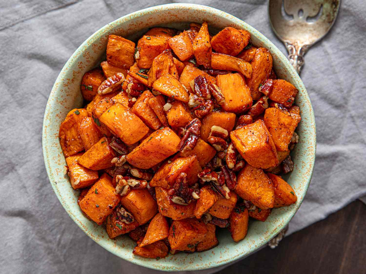 Sweet potatoes and pecans in a bowl.