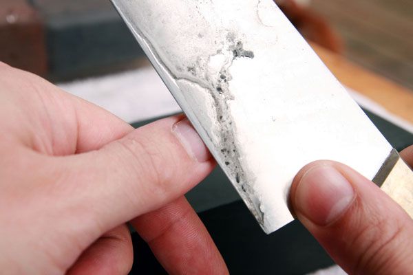 Checking for a burr on a thumbnail