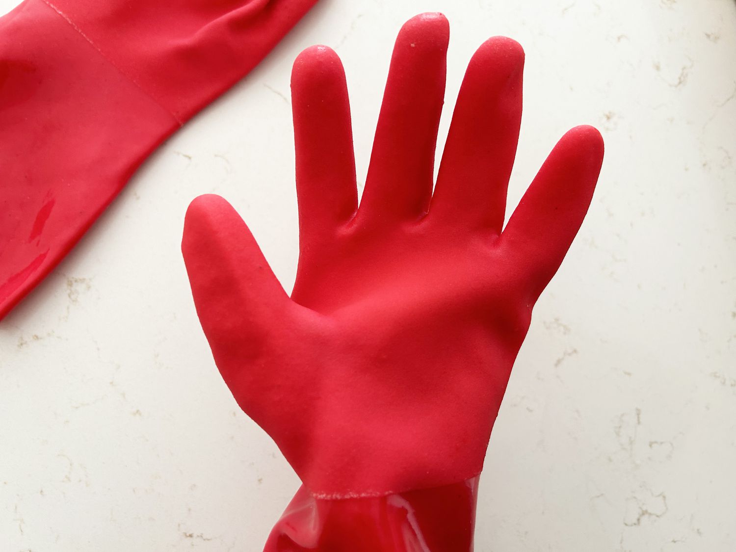A bulky pair of dish gloves