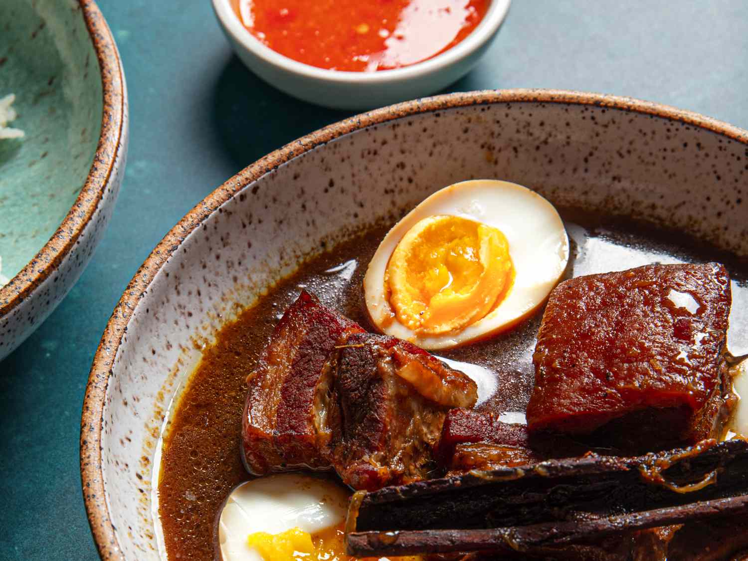 Close up of half an egg in the stew