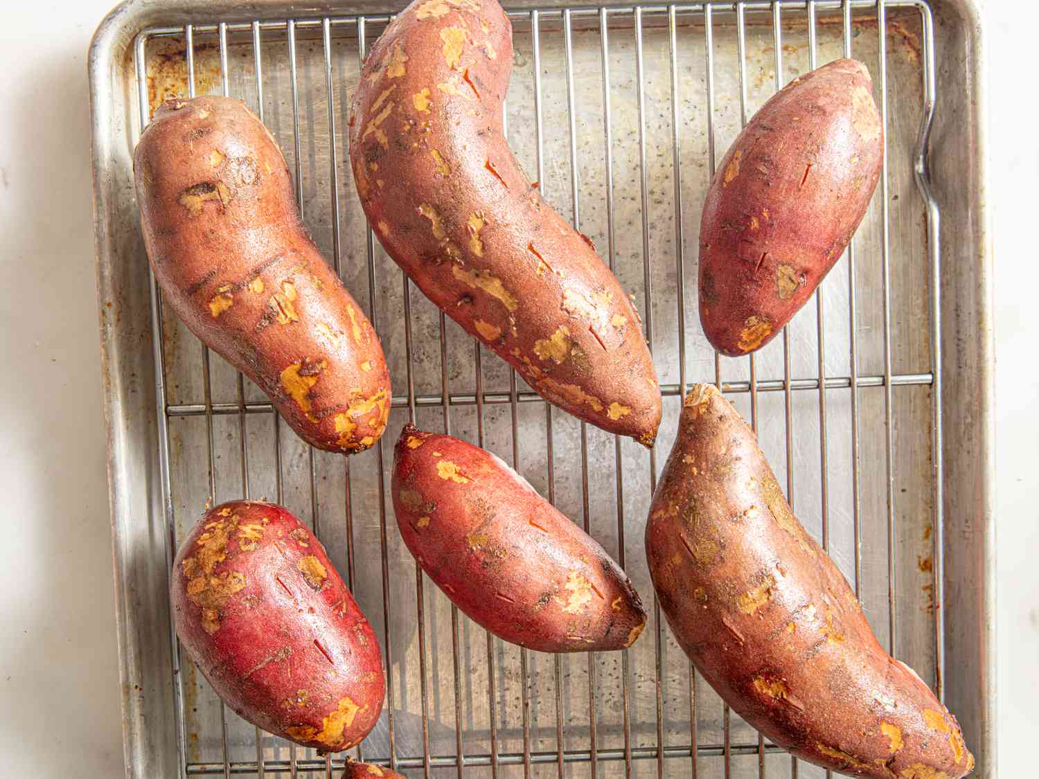 Overhead view of sweet potatoes are on a rack