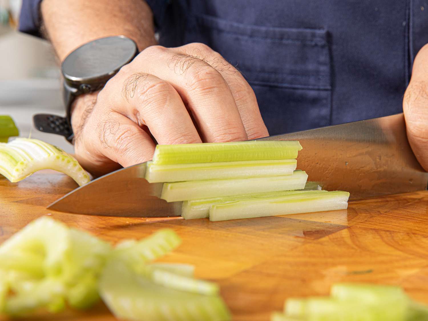 Cutting celery into strips