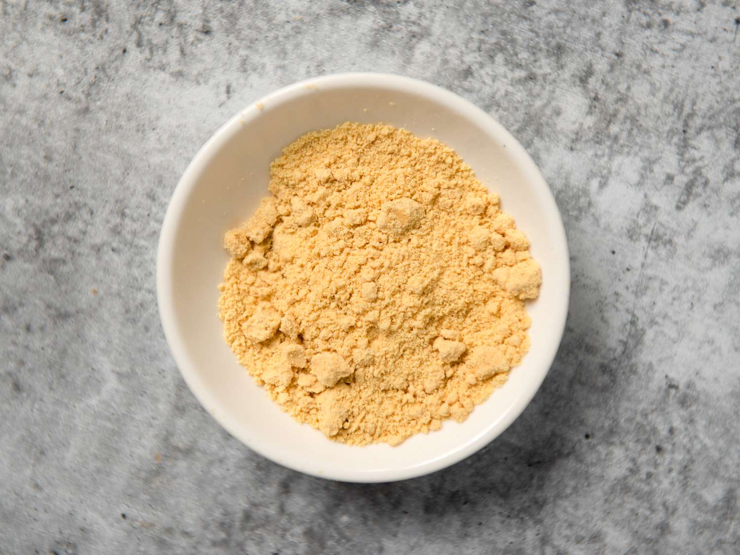hot mustard powder in a small white bowl
