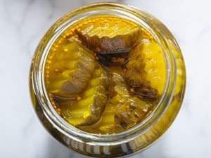 A jar of breadandbutter pickles viewed from above