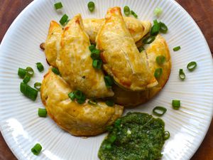 Overhead view of Potato and Corn Empanadas With Aji