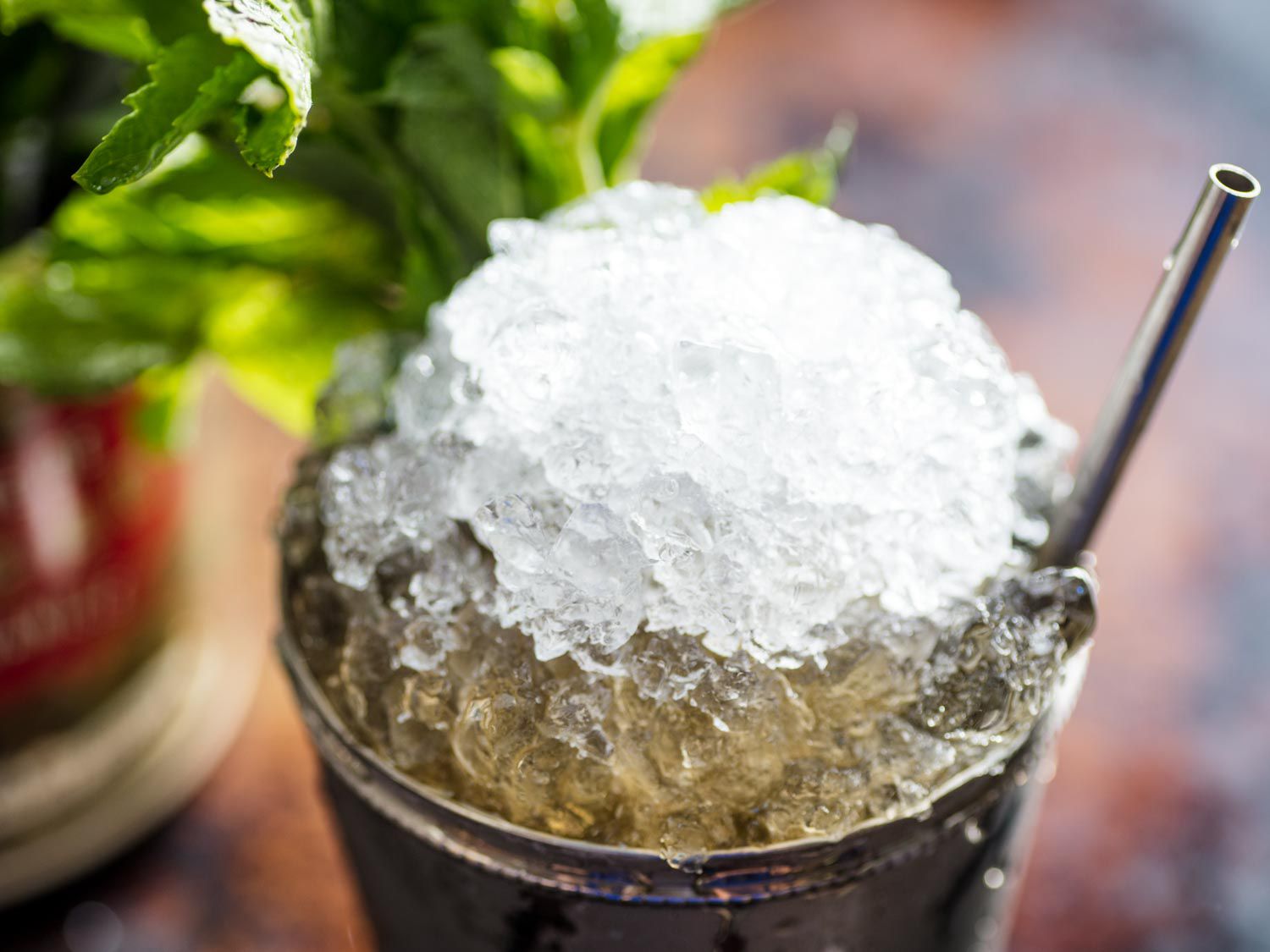 Close-up of a mound of crushed ice on top of a julep cup