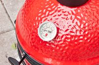 The temperature gauge on the Kamado Joe KJ13RH 13.5 inch Joe Jr. Charcoal Grill