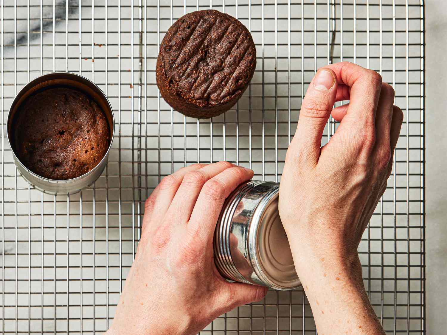 Overhead view of popping bread out of cans