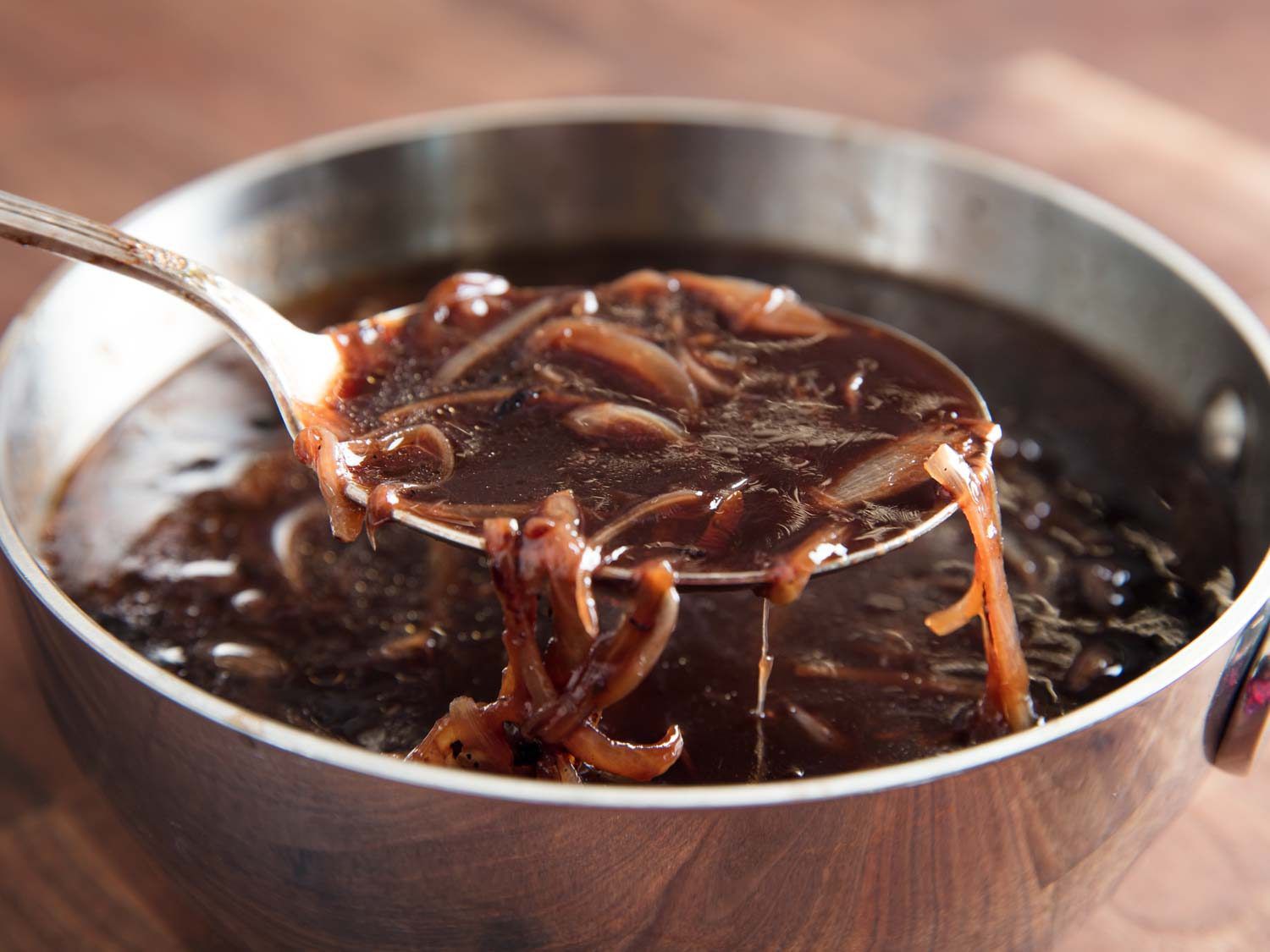Close-up of red wine shallot jus.