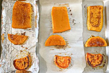 Baked vegetable slices on foillined trays arranged in sections