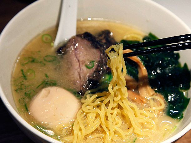 A bowl of yebisu ramen with thick, wavy noodle.